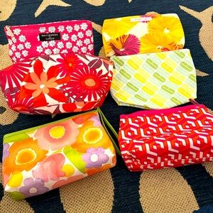 6 Clinique makeup bags. $10 for all 6